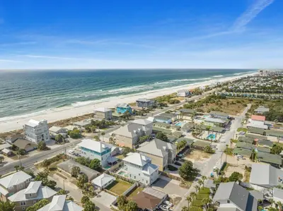 an aerial view of the beach and buildings at Three Master Bedrooms! Easy Beach Access! Gulf Views in Panama City Beach