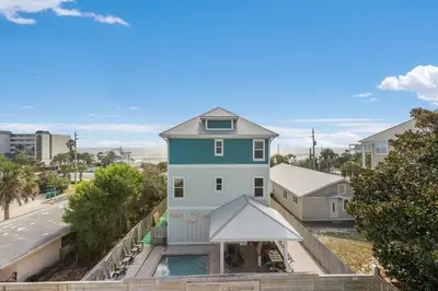 an aerial view of a house with a pool at Three Master Bedrooms! Easy Beach Access! Gulf Views in Panama City Beach