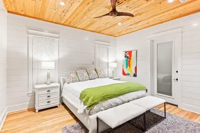 a bedroom with a bed and a wooden ceiling at 12 Periwinkle Ln - Beach Blessings in Santa Rosa Beach