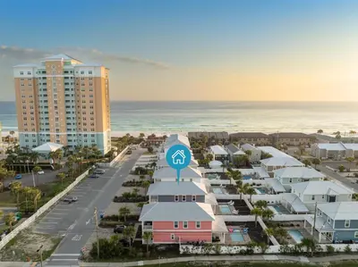 an aerial view of a resort near the ocean at Fabulous Modern Beach House - 4BR, 35BA: POOL/Beach View & Access/Balcony in Panama City Beach