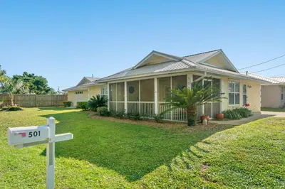 a house with a cross in front of it at Contemporary Bungalow / West End PCB / Available NOW! / Perfect for Family in Panama City Beach