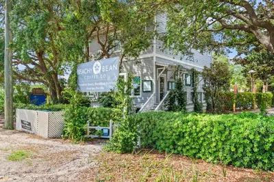 a house with a sign in front of it at One Upon A Tide - Private Pool - Mother-In-Law Suite in Santa Rosa Beach