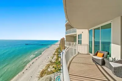 a balcony with a view of the beach and ocean at Aqua Resort 2108 - Beach Daze in Panama City Beach