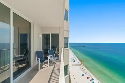 a view of the beach from the balcony of a condo at Tidewater Beach Luxury Penthouse with Resort Amenities and a View! in Panama City Beach
