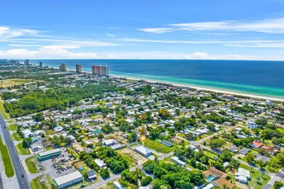 an aerial view of a city and the ocean at Brand New Home with In-ground Pool, Four Houses From Beautiful Laguna Beach in Panama City Beach