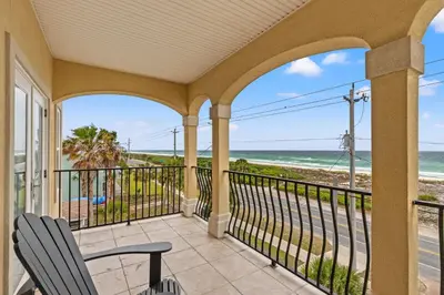 a balcony with a view of the beach at 2 Gulf View Balconies! 3 Story Townhome With 4 Bedrooms, 4 Bathrooms! Sleeps12 in Panama City Beach