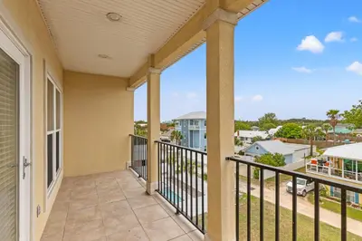 a balcony with a view of a street at 2 Gulf View Balconies! 3 Story Townhome With 4 Bedrooms, 4 Bathrooms! Sleeps12 in Panama City Beach