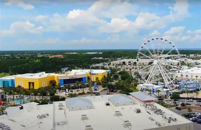 an aerial view of a amusement park with a ferris wheel at Top of the Gulf 825 in Panama City Beach