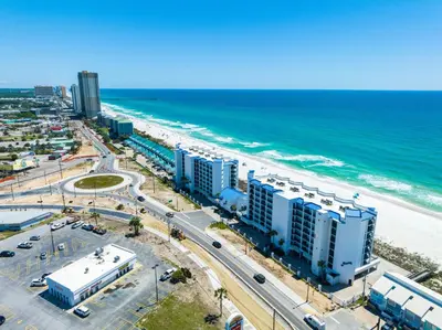 an aerial view of a beach with buildings and the ocean at AquaVista Beach Resort by Sand Seeker Vacations in Panama City Beach
