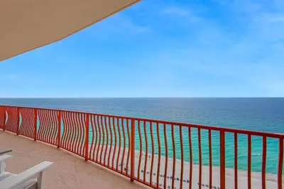a balcony with a view of the ocean at Hidden Dunes 1803 in Panama City Beach