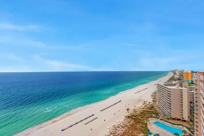 an aerial view of a beach and the ocean at Hidden Dunes 1803 in Panama City Beach