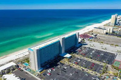 an aerial view of a building on the beach at The Summit 817 in Panama City Beach