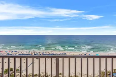 a view of the beach from a balcony at The Summit 1503 in Panama City Beach
