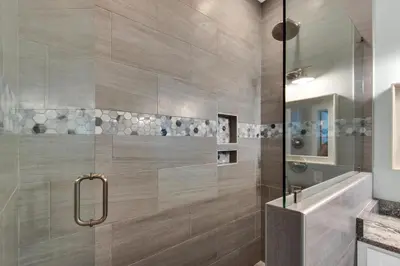 a bathroom with a shower with a glass door at Bless My Sol in Santa Rosa Beach