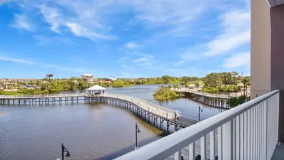 a view of a river from a balcony at Deep Blue at Laketown Wharf #214 by Nautical Properties in Panama City Beach