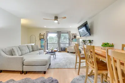 a living room with a couch and a table at Santa Rosa Beach Townhome Patio, Walk to Beach! in Santa Rosa Beach