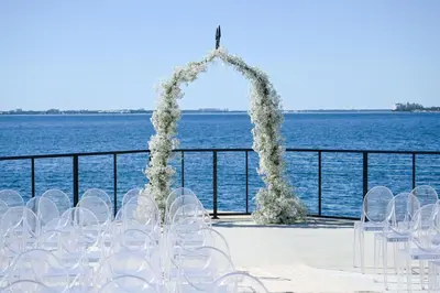 a set up for a wedding with a view of the water at Hotel Indigo - Panama City Marina by IHG in Panama City