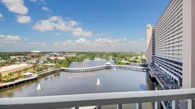 a view of a river from a balcony of a building at Shell Yeah at Laketown Wharf #730 by Nautical Properties in Panama City Beach