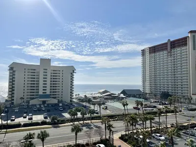 a view of a parking lot in front of some buildings at Beach Dream Believer at Laketown Wharf #518 by Nautical Properties in Panama City Beach