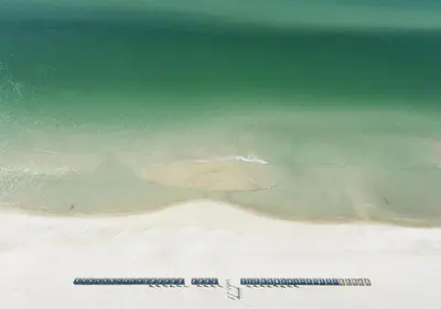 an aerial view of a beach with the ocean at Tidewater 2204 in Panama City Beach