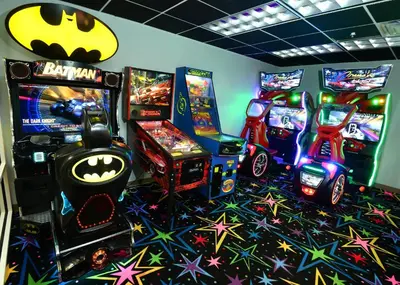 a room with arcade games and video game machines at Tidewater 2613 in Panama City Beach
