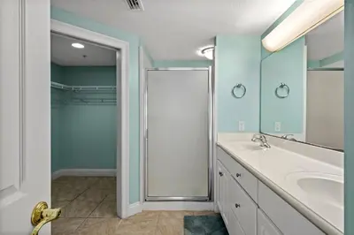 a bathroom with a shower and a sink at Treasure Island #0105 in Panama City Beach