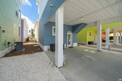 an empty parking lot in front of a building at Summer Towne Cottages #16 in Panama City Beach