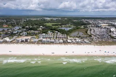 an aerial view of a beach with a group of people at Summer Towne Cottages #16 in Panama City Beach