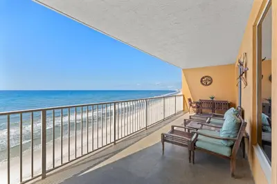 a balcony with a view of the beach at Treasure Island #0907 in Panama City Beach