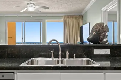 a kitchen sink with a fish head on the counter at Treasure Island #0907 in Panama City Beach