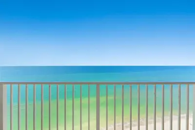 a view of the beach from a balcony at Treasure Island #2110 in Panama City Beach
