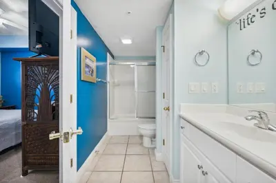 a bathroom with a sink and a toilet at Treasure Island #1608 in Panama City Beach