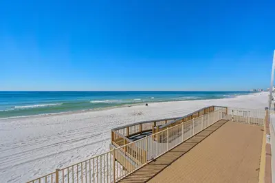 a view of the beach from the boardwalk at Treasure Island #1110 in Panama City Beach