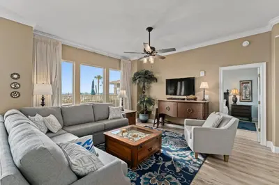 a living room with a couch and a table at Gulf Crest #0106 in Panama City Beach