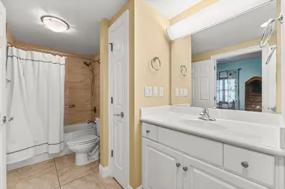 a bathroom with a sink and a toilet at Treasure Island #1710 in Panama City Beach
