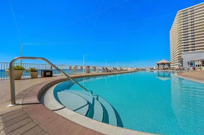a large swimming pool on the side of a building at Treasure Island #1710 in Panama City Beach