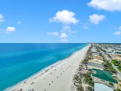 an aerial view of the beach in front of a resort at Seychelles 1609 in Panama City Beach