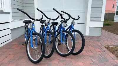 a row of blue bikes parked next to a building at 30A Sea View Villas by Panhandle Getaways in Santa Rosa Beach