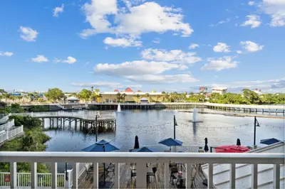 a view from a balcony of a marina with a dock at Laketown Wharf #124 by Nautical Properties in Panama City Beach