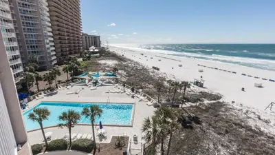 an aerial view of a beach with a swimming pool at 5-STAR BEACHFRONT D505 - Total Remodel - Nov & Dec Snowbirds Welcome! in Panama City Beach